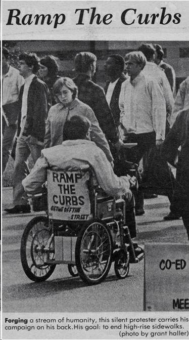 Newspaper photo of man in wheelchair