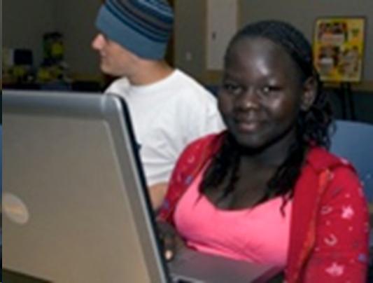 028_RDE_Collab_Images.jpg A young woman uses a laptop computer