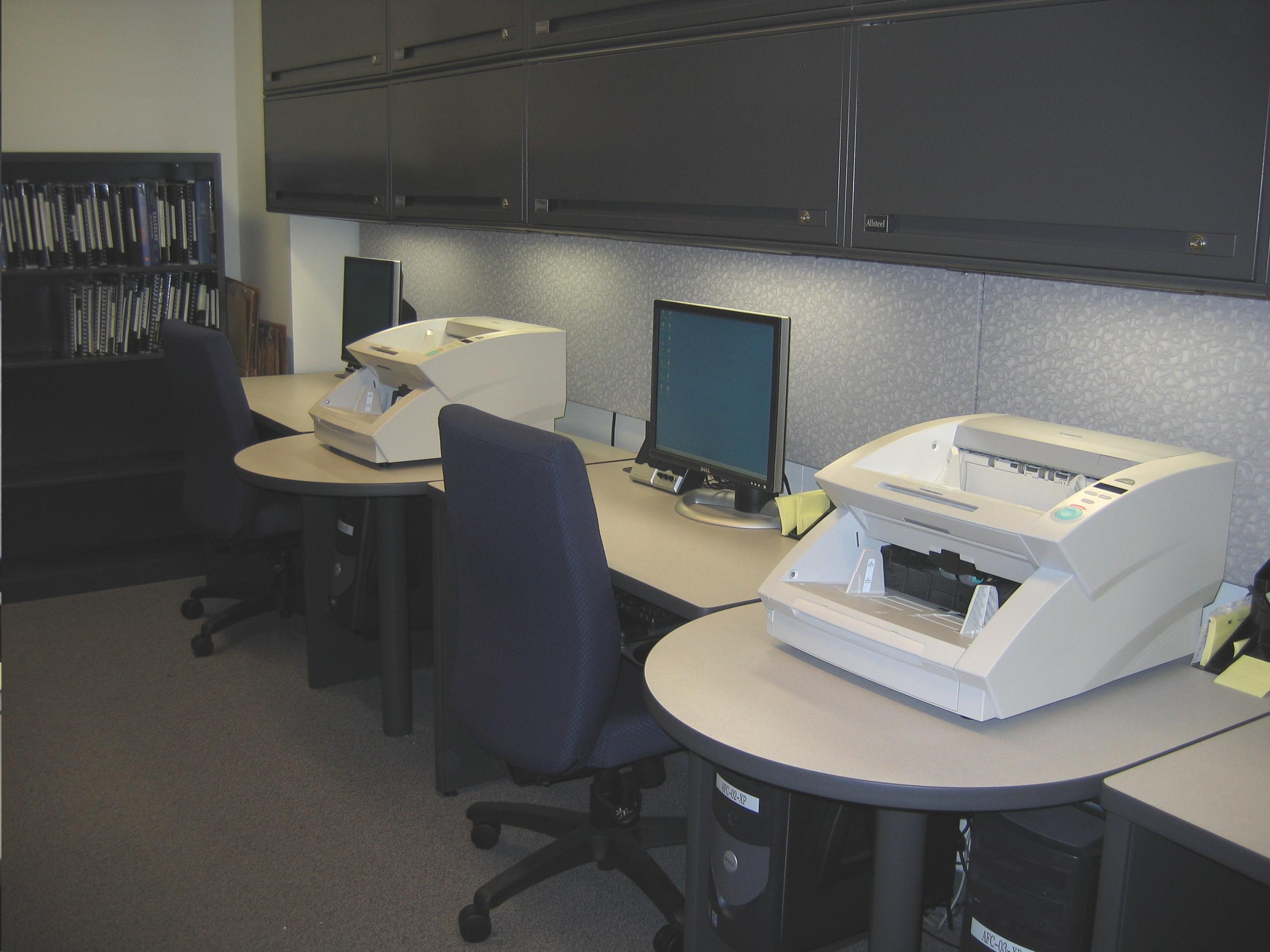 Picture of the computer workstations with high-speed scanners in the Alternate Format Production Center