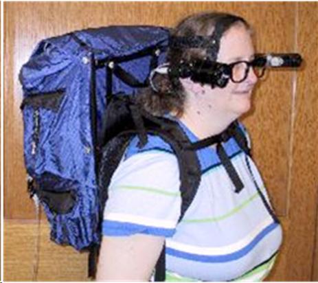 Woman with obstacle detection glasses on